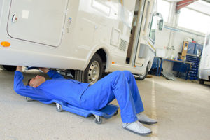 RV Body Repair - Technician Working on RV